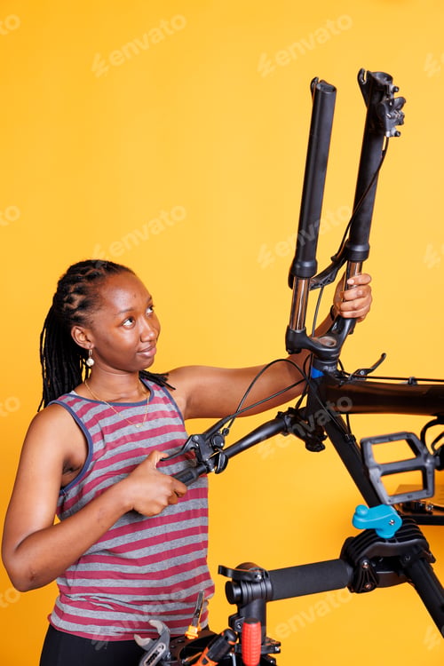 Preview: Female fixing disassembled bicycle