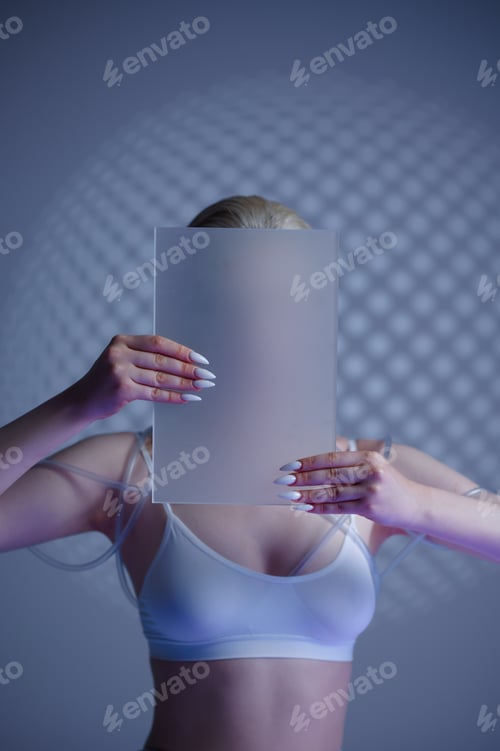 Preview: Futuristic woman holds blur glass at her face