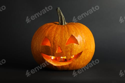 Preview: Halloween pumpkin head jack lantern on dark background