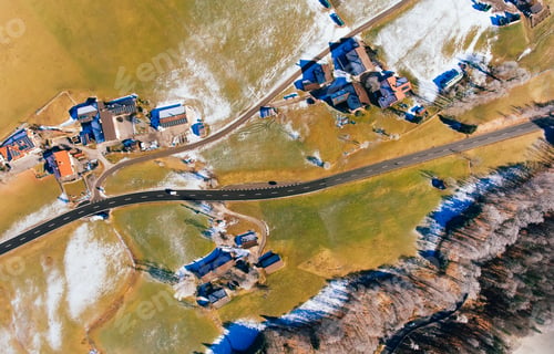 Preview: Asphalt roadway through small settlement