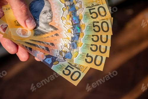 Preview: Hands holding australian dollars 50 banknotes. Finance and payment concept