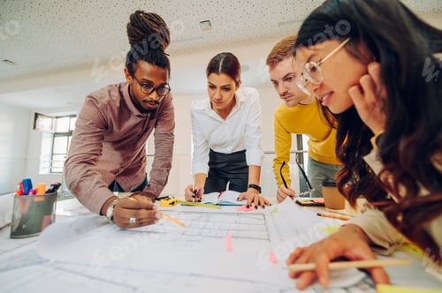 Preview: Multiracial team of engineers or architects having a meeting in an office