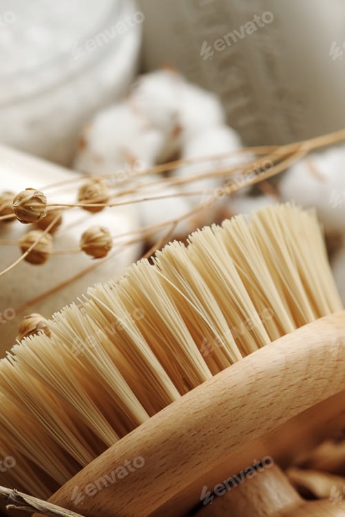 Preview: spa objects in a wicker basket on light background. Skin care, body treatment concept.