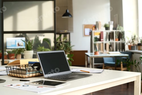 Preview: Blank Screen Laptop in Sunlit Office