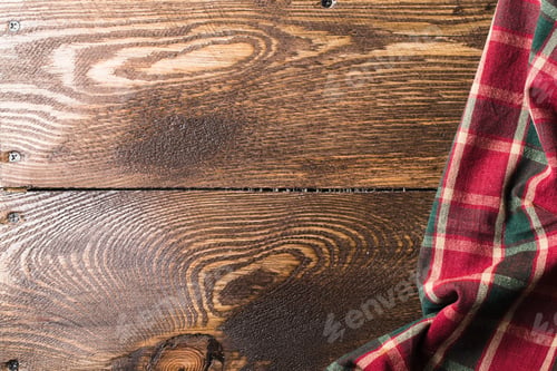 Preview: Rustic wooden boards with a red checkered tablecloth