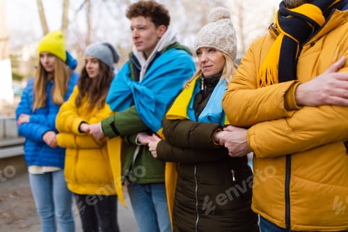 Preview: Protestors with Ukrainian blue and yellow flags protesting against war in Ukraine in street