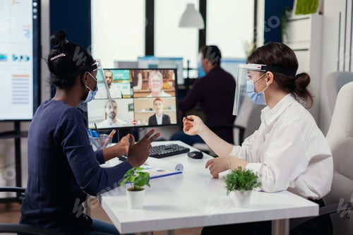 Preview: Manager and black woman having a conversation during video call