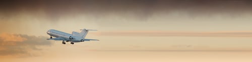 Preview: Commercial airplane jetliner take off, beautiful dramatic sunset on background