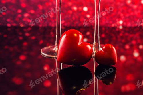 Preview: Two glasses of champagne and two red hearts