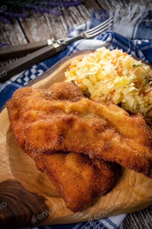 Preview: Two fried cod fillet pieces.
