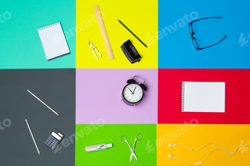 Preview: school supplies at colorful paper background