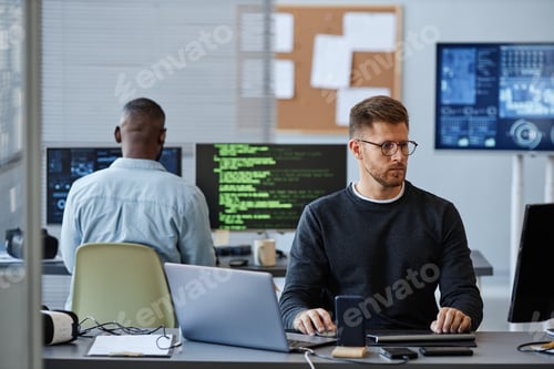 Preview: Man Working in IT Company Office