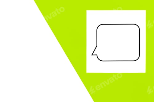 Preview: Speech bubble on white paper on green background, flat lay.
