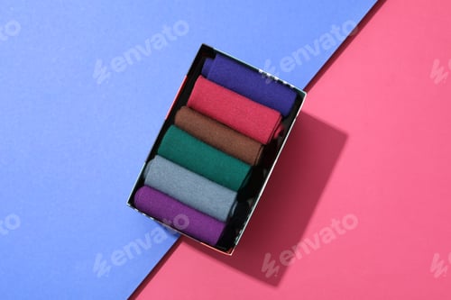 Preview: Box with socks on two tone background