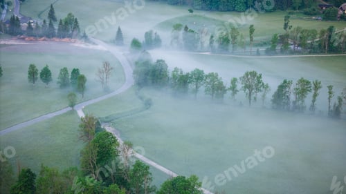 Preview: Beautiful Sunrise Illuminating the Foggy Mountains of Zgornje Jezersko