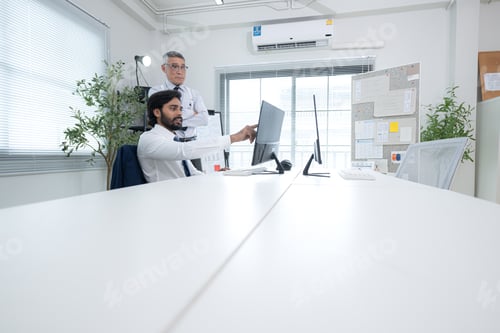 Preview: In a contemporary office, two senior executives with a mission to brainstorm and monitor