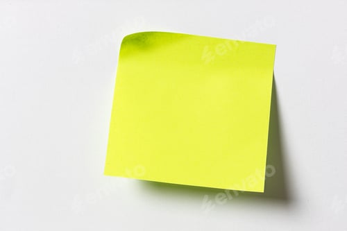 Preview: Blank fluorescent green sticky note on white wall