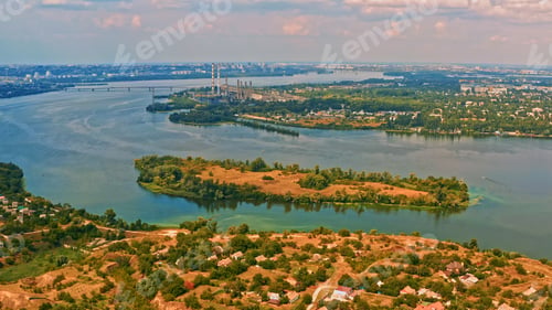 Preview: Beautiful summer landscape with a wide river and green coastline.