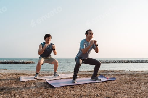 Preview: Men doing exercise together and sporty active outside sea beach training active lifestyle.