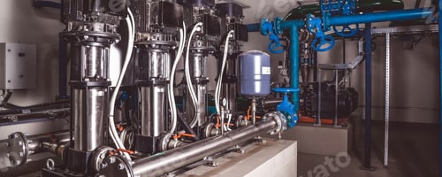 Preview: Industrial interior of a water pump system highlighting automatic control technology