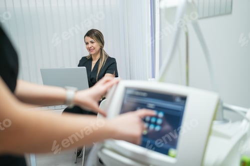 Preview: Esthetician managing a skincare clinic with medical equipment