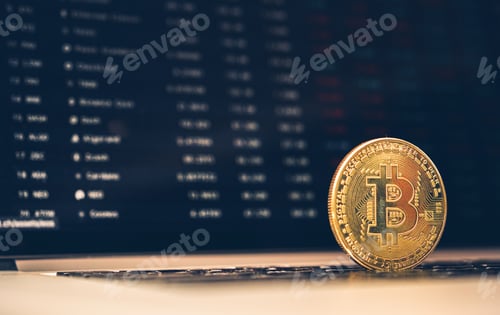 Preview: Golden Bitcoin Metal Symbolic Coin on Computer Keyboard