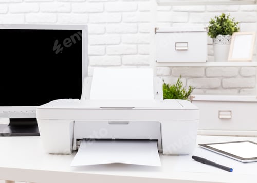 Preview: Printer in a modern workspace printing documents on a clean desk with a computer and stationery