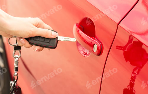 Preview: Close-up, girl opens the door car by key