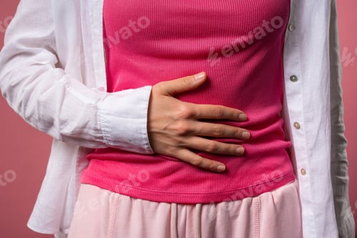 Preview: Young woman squeezing belly with hands. abdominal pain, suffering stomach ache