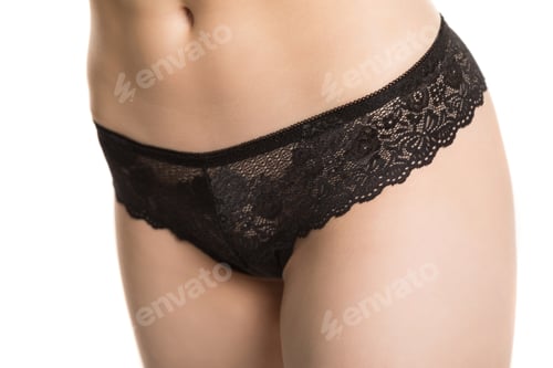 Preview: fit girl in panties on a white background, half-length shot