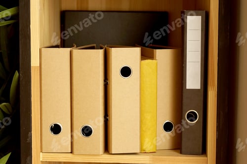 Preview: Folders stand on the shelf in the office