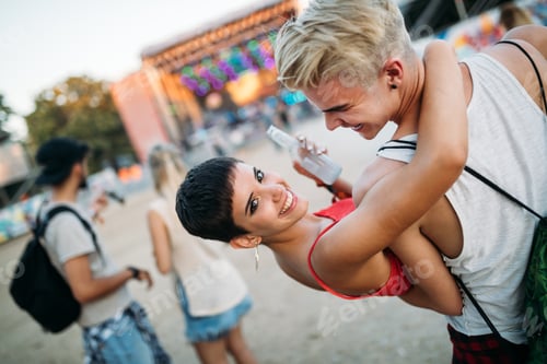 Preview: Group of friends having fun time at music festival
