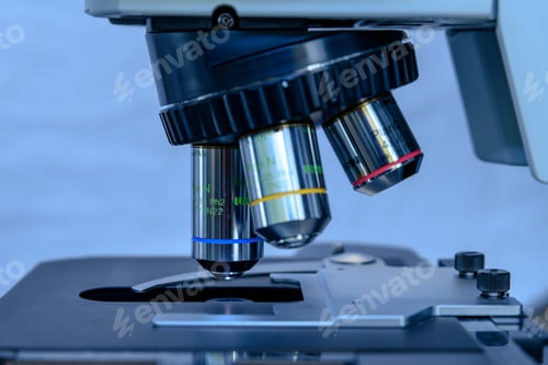 Preview: Closeup shot of laboratory microscope lens for conducting coronavirus research