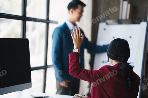 Preview: Coworkers team at work. Group of young business people working together in modern office.