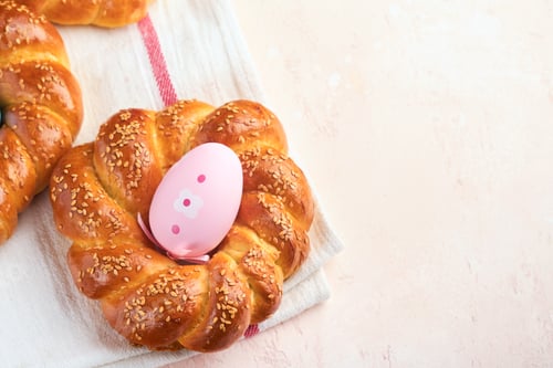 Preview: Spanish Easter cake. Traditional mona de pascua typical in Spain with boiled eggs eaten inside on pi