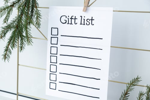Preview: Preparation for winter holidays. GIFT LIST text on paper note. Celebration gifts and presents