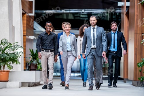 Preview: Young Multi Ethnic Business People Group Walking Standing And Top View