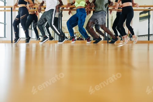 Preview: Dancers standing on tiptoes