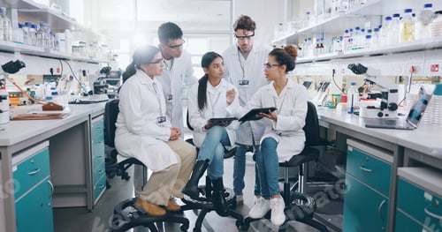 Preview: Tablet, science and group of people in laboratory for learning, cancer cure or medical development.