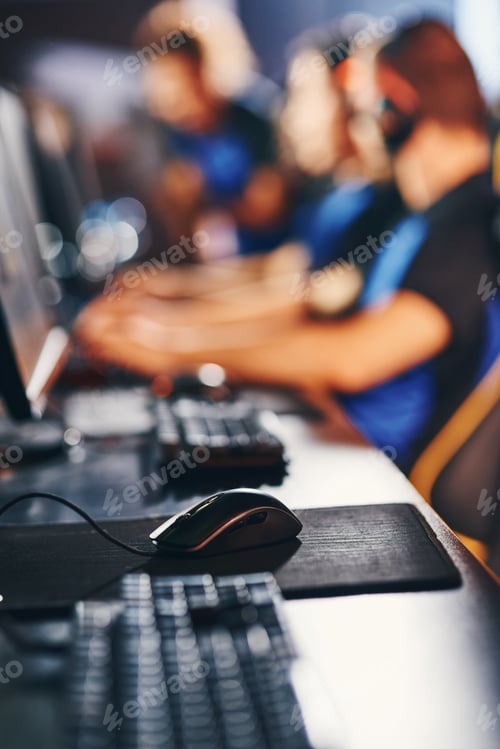 Preview: Close up vertical shot of professional cyber sportsman workplace with desktop computer, keyboard and