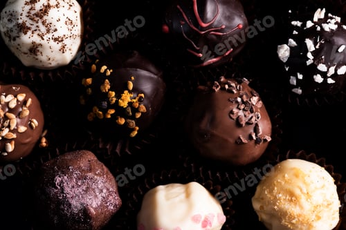 Preview: Chocolate Pralines Decorated by Hand. Close Up View on Details