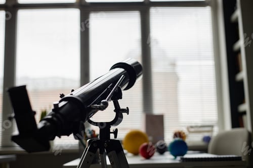 Preview: Astronomical Telescope Standing Indoors near Window in Science Classroom
