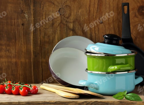 Preview: kitchen utensils pots and pans on the table