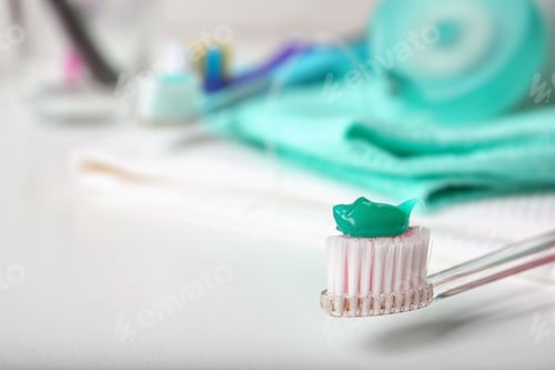 Preview: Manual toothbrush with paste on table. Dental care
