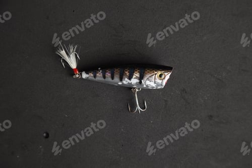 Preview: Closeup shot of fishing bait isolated on a black background