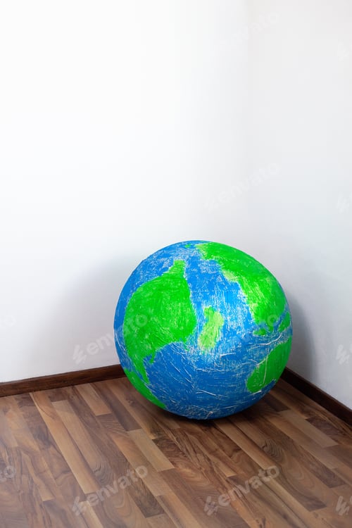 Preview: Eco problem. Planet earth in the corner of the room. Surrealism.