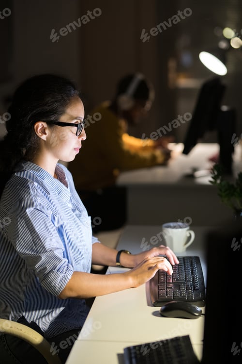 Preview: Latin-American Woman Working at Night