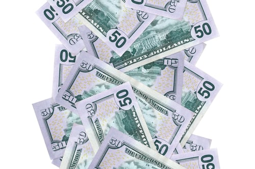 Preview: 50 US dollars bills flying down isolated on white. Many banknotes falling with white copyspace on l