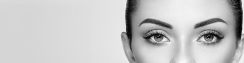 Preview: Beautiful woman with long false eyelashes