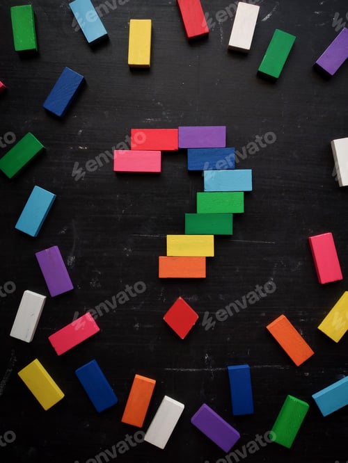 Preview: Colorful question mark on a black background